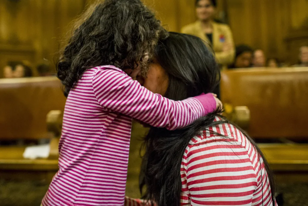 Woman with a child in court