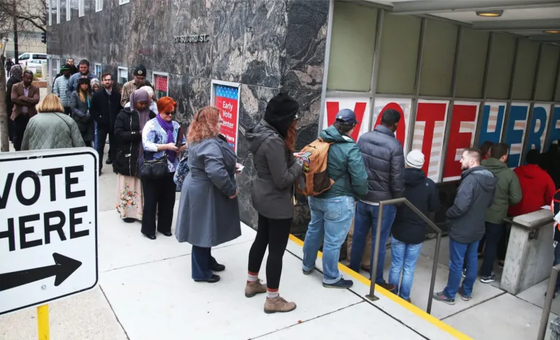 A line of voters seen waiting to cast their ballots