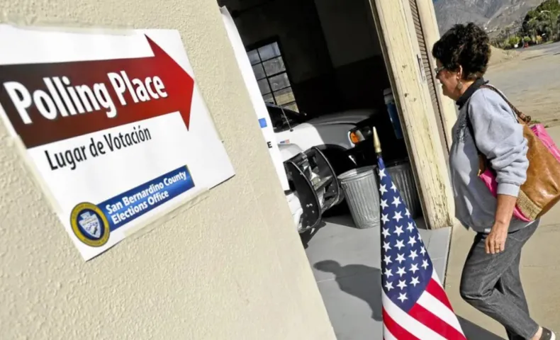 Photo of a San Bernardino County voter heading into a polling place