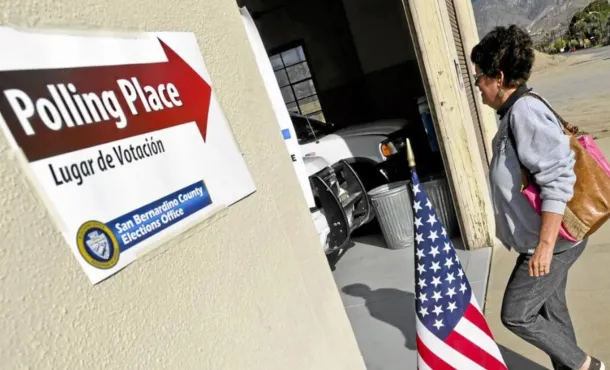 Photo of a San Bernardino County voter heading into a polling place