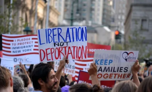 Demonstrators rallying in support of keeping immigrant families together